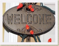 IMG_2705_Christmas_lights_ext_2009 * Antique metal Welcome/Go Away sign illuminated with red Christmas lights. The sign was found in Virginia City, Nevada.IMG 2705 Christmas lights ext 2009.JPG * Antique metal Welcome/Go Away sign illuminated with red Christmas lights. The sign was found in Virginia City, Nevada.IMG 2705 Christmas lights ext 2009.JPG * 3648 x 2736 * (2.83MB)